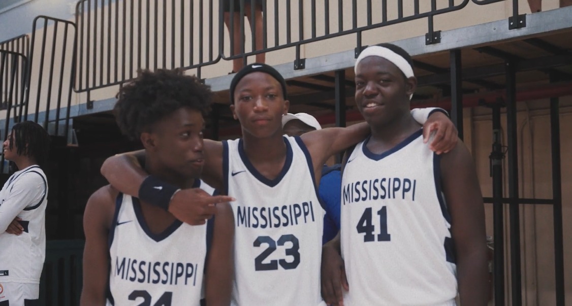 Students smiling for the Camera